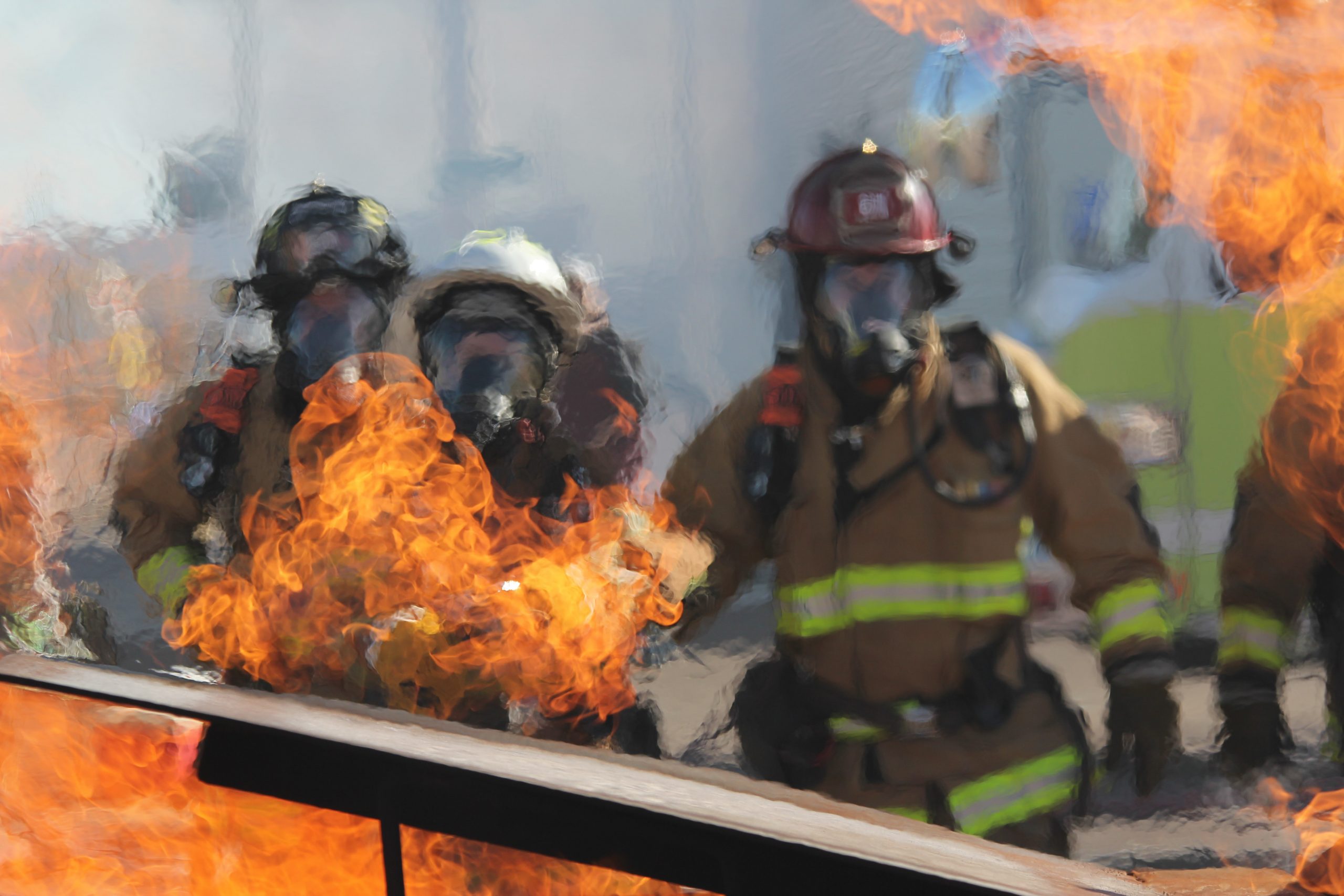 an image of fire fighters, tackling a blaze